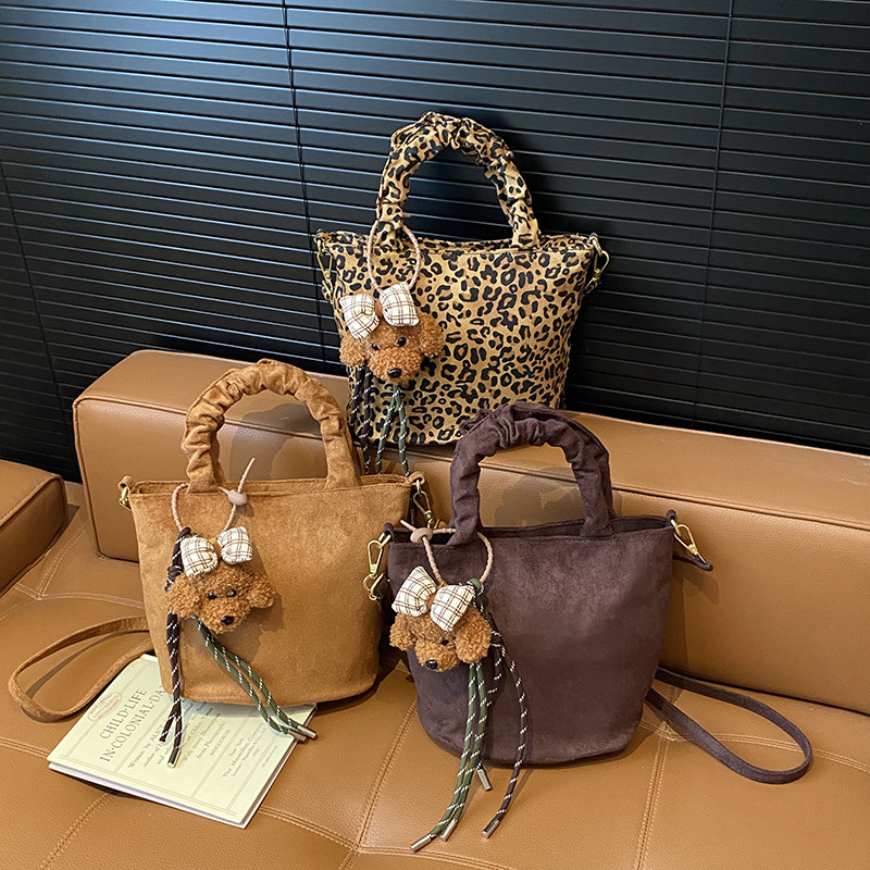 Moda leopardo bolso de niña lindo perro colgante mochila de niño otoño y invierno nuevo bolso de niños de peluche