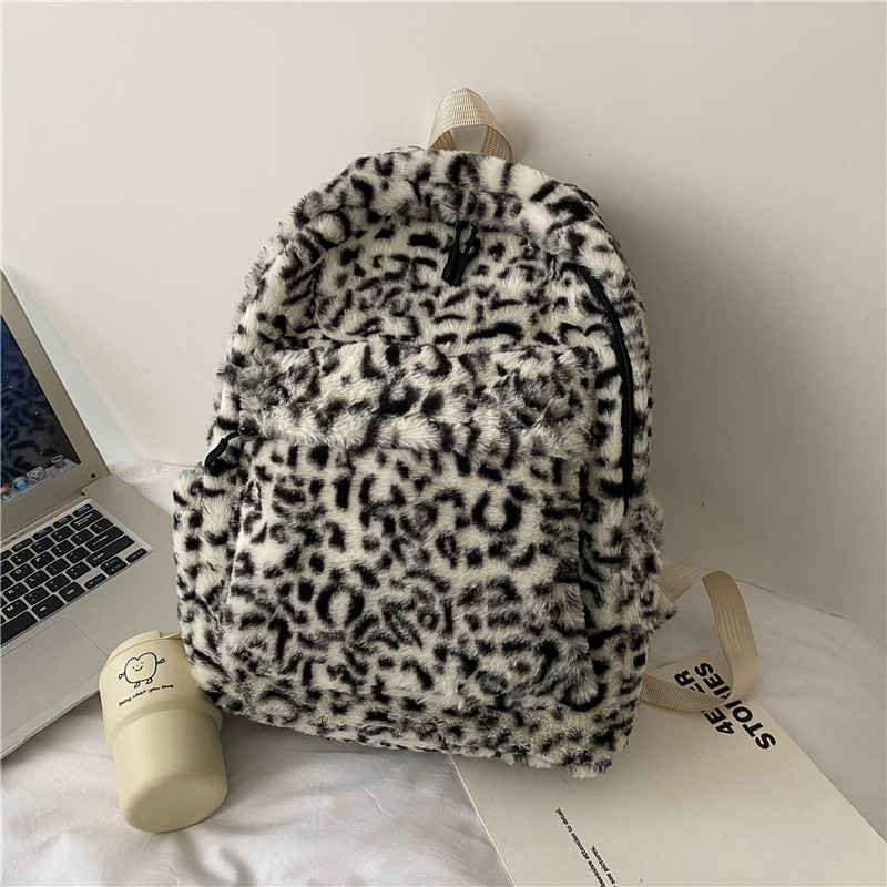 Mochila de moda estampado de leopardo bolsa de felpa para mujer 2022 invierno nuevo simple estudiante mochila para mujer