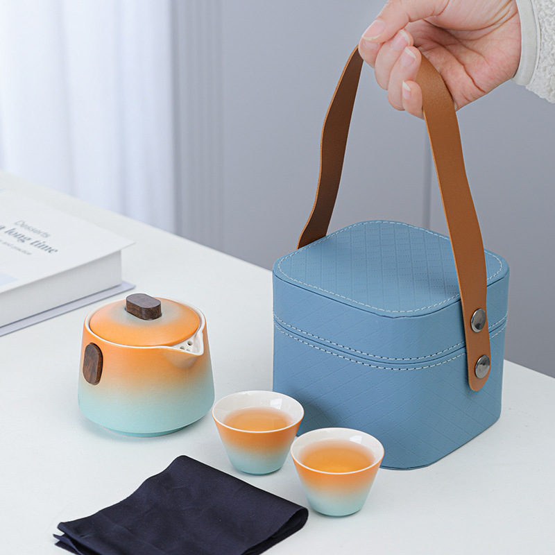 Outdoor travel tea set ceramic Express Cup One Pot Two Cups portable kung fu suit tea making business hand gift