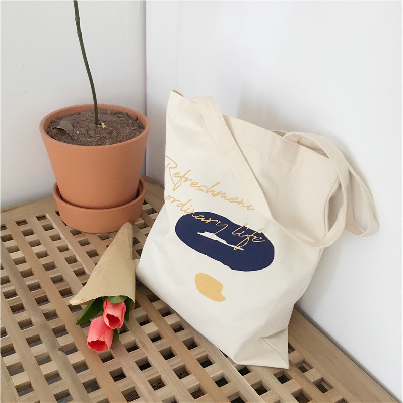 E131 canvas bag, Korean-style ins hand-held shoulder bag, color block letter graffiti shopping bag, female student's search for sources undefined