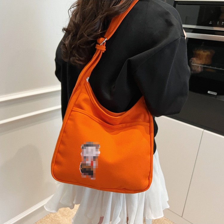 2025 nuevo bolso de lona bolso de hombro de gran capacidad para mujer bolso casual de todo fósforo para estudiantes en clase bolso de viaje