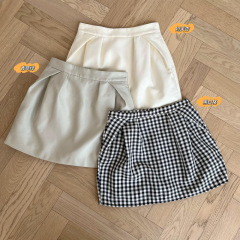 新款经典系黑白格短款半身裙女夏季设计感百搭休闲花苞短裙子