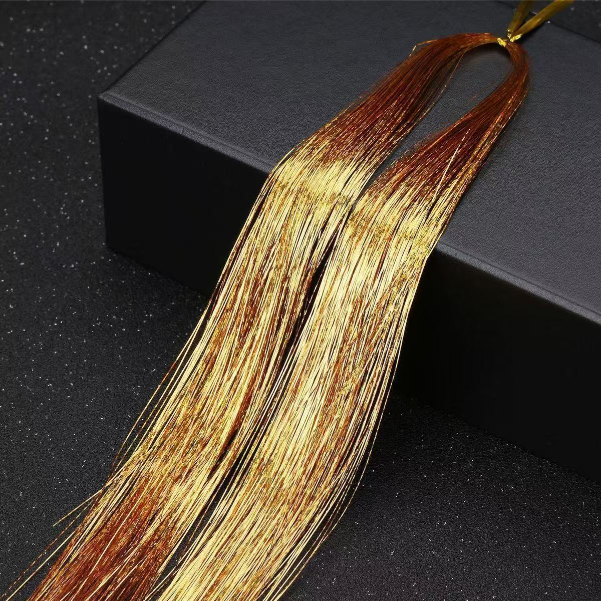 Las extensiones de cabello de alambre láser europeas y estadounidenses pelucas de color oro brillante extensiones de cabello de 120cm extensiones de cabello