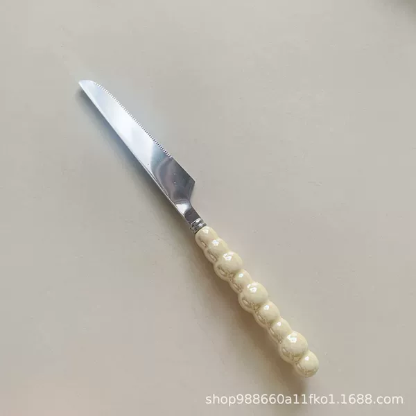 Buttery yellow steak knife