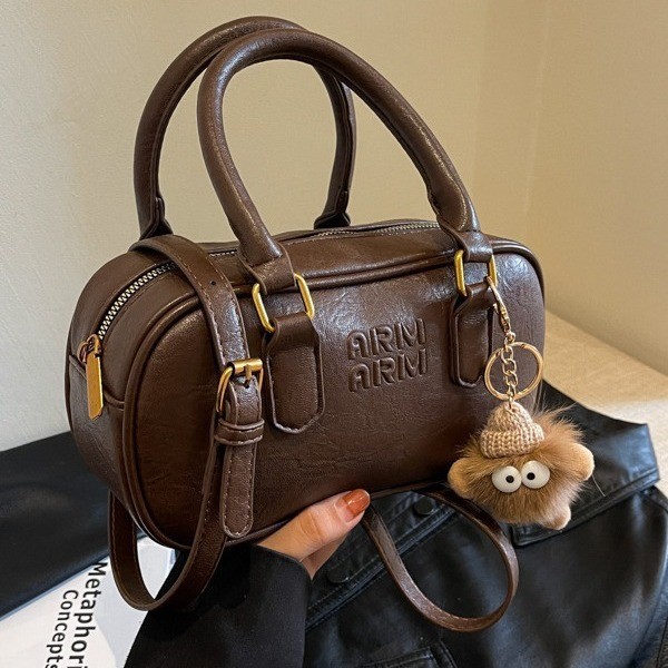 Bolso de mujer alemán retro bolso de mano mujer nuevo otoño invierno bolso de bolos de moda bolso de mano universal bolso de mano mujer