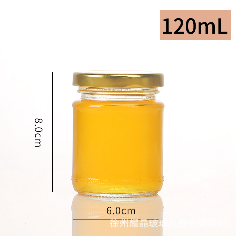 Botella de vidrio redonda de grado alimenticio, botella enlatada transparente sellada, botella de salsa de chile vacía, botella de miel con tapa para cocinar