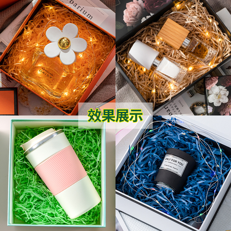 En stock al por mayor de papel de color de la raqueta de seda caja de regalo de dulces adorno de relleno de papel de la raqueta de seda 500g