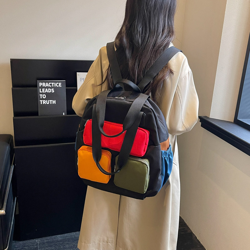 2026 nueva mochila de gran capacidad de viaje mochila de moda coreana multifuncional empalme día de nylon color contrastante
