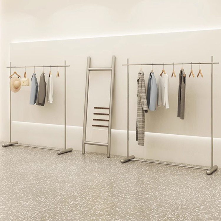 Tienda de ropa mayorista piso de exhibición vertical de acero inoxidable dibujado percha interior balcón estante de isla image 3