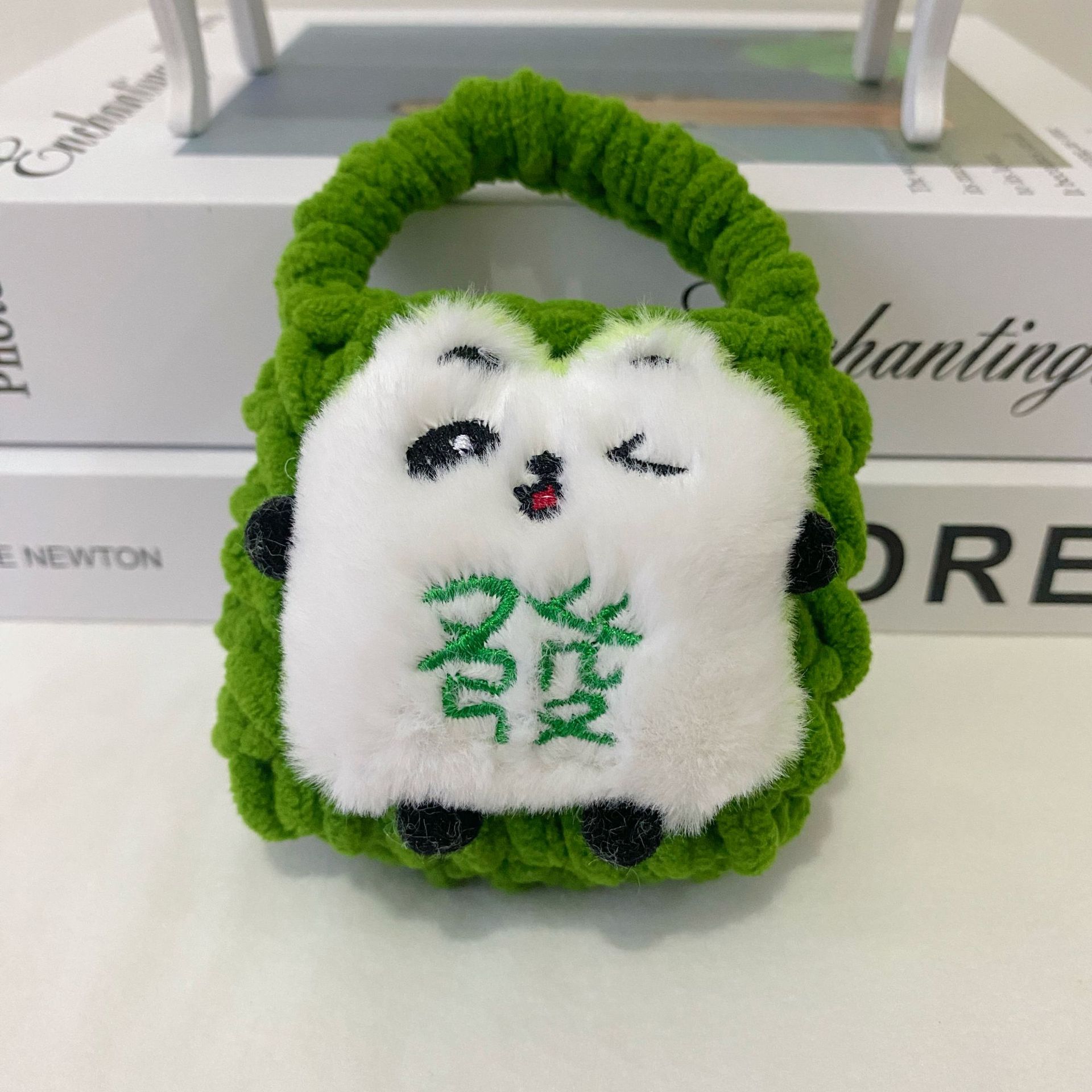 Celebración de Año Nuevo gran león rojo despertar dragón muñeca de peluche dibujos animados tejido a mano bolsas de auriculares Bluetooth bolsas de cambio al por mayor