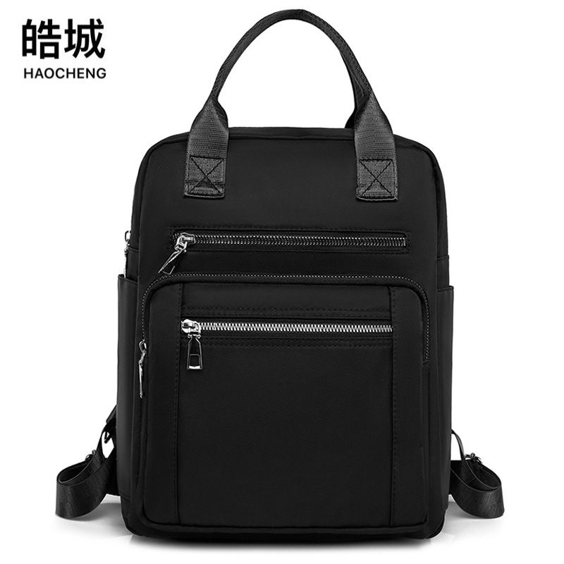 Comercio exterior nueva versión coreana de la mochila Oxford para mujer, mochila de viaje al aire libre de todo fósforo de moda, mochila escolar, bolso