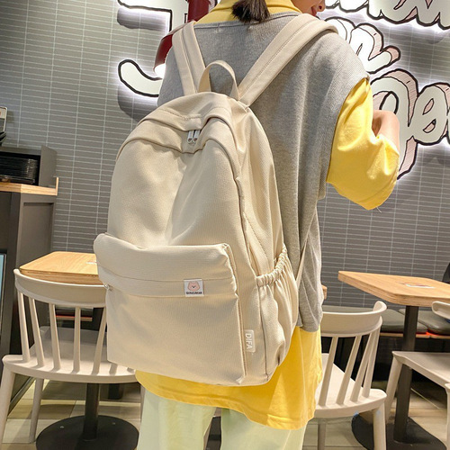 ins Japanese girl schoolbag female Korean version junior high school student cute solid color backpack high school student large capacity