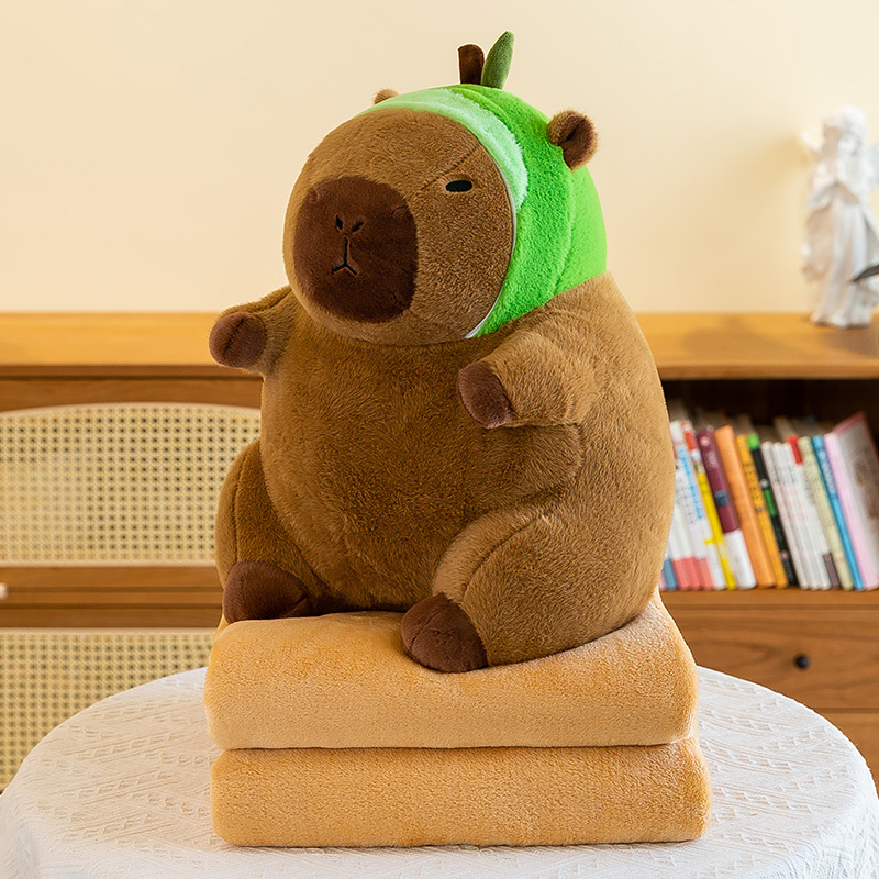 Caricatura capibara almohada manta dos en uno Carpibara cojín aire acondicionado es de doble uso niños siesta manta regalo