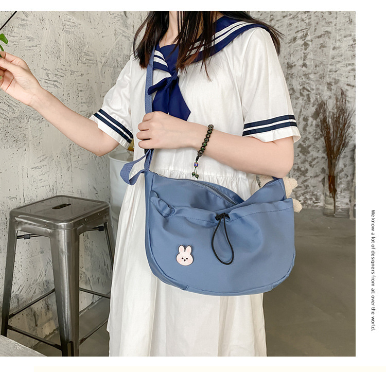 The new 2022 Little Bear canvas small bag for women is simple and versatile. The student dumpling bag is a trendy casual single-shoulder crossbody bag undefined