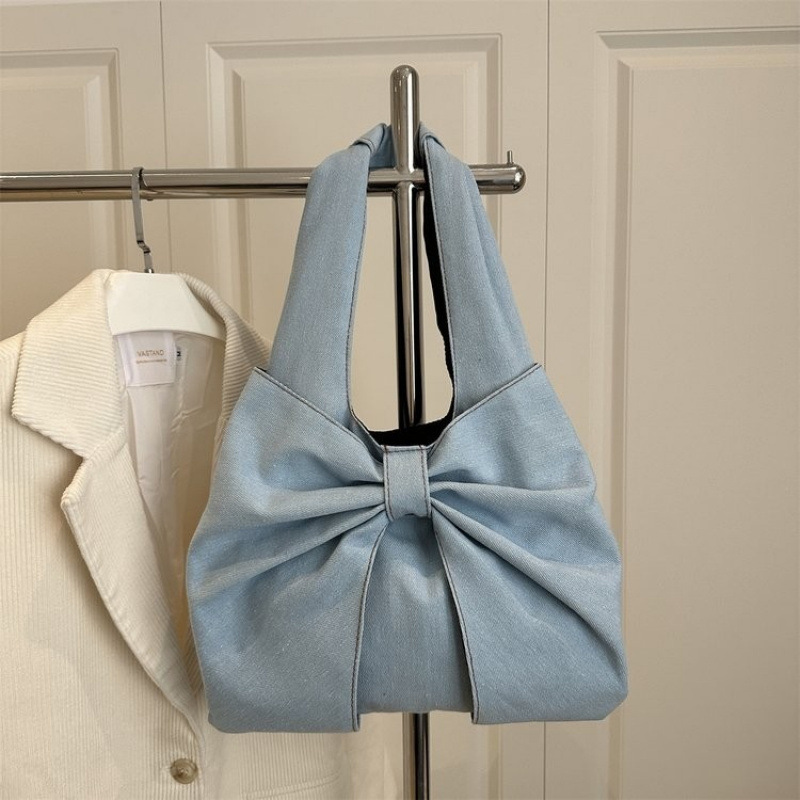 Transfronterizos nuevos grandes bolsas de brazo de diseño de mujer denim mano grande arco denim de manga corta