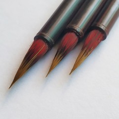 Xiao Hong Mao copies Buddhist scriptures with tiny script calligraphy, traditional Chinese brush painting, thin gold lines, Jin style, painting outlines, Chinese painting art.