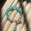 Blue bracelet with bow pearl