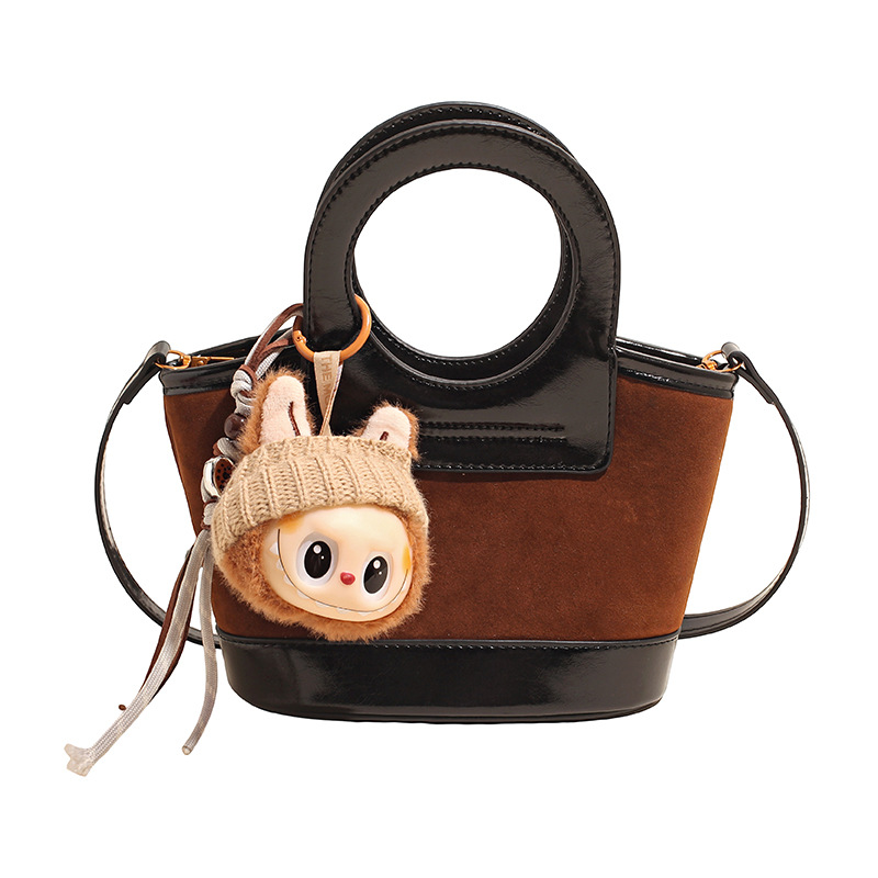 Bolso de mano coreano transfronterizo empalmado bolso de cubo de agua mujer otoño / invierno 2025 nuevo estilo de moda bolso de hombro bolso de viaje