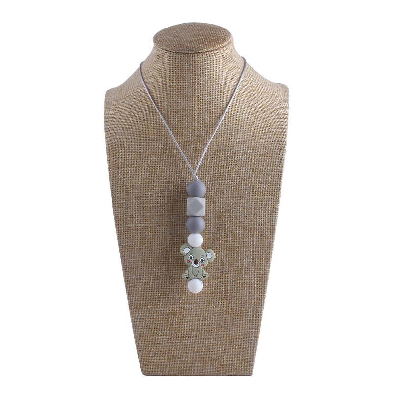 Bebé molar mordedor perlas colgante masticable colgante accesorios de ropa de los niños de dibujos animados animal colgante mordedor collar