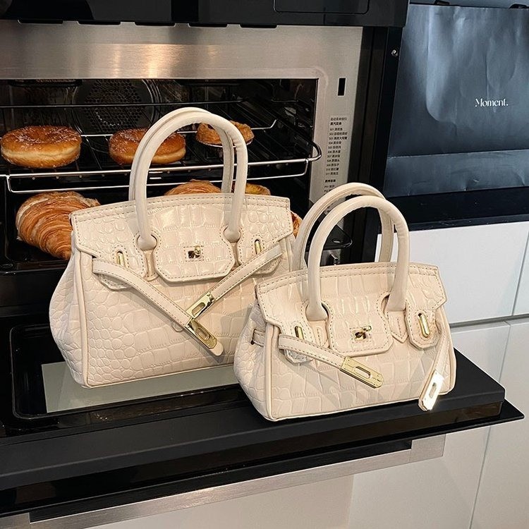 Cross-border retro cocodrilo portátil bolso Kelly mujer 2025 nuevo estilo extranjero de alta moda mochila de hombro