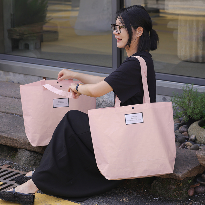 Tienda de ropa bolsa de tejido impresa LOGO ropa de mujer bolsa de compras regalos ropa al por mayor bolsa personalizada