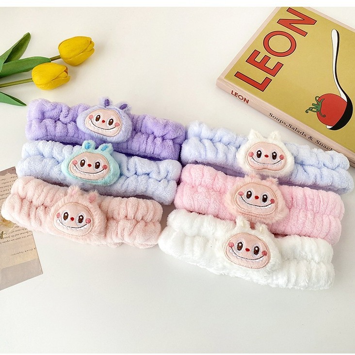 Nuevos dibujos animados tela de tela correa de pelo al por mayor extraña peluche lavado facial maquillaje de tela de tela de tela de banda de mariposa final de cabello de chicas