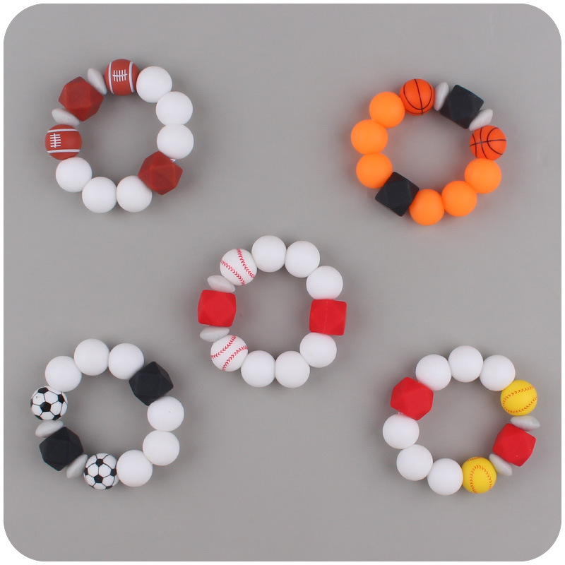 Nuevo bebé suministros de dibujos animados de fútbol de silicona impresa pulsera creativa DIY mordedura de silicona juguete de goma