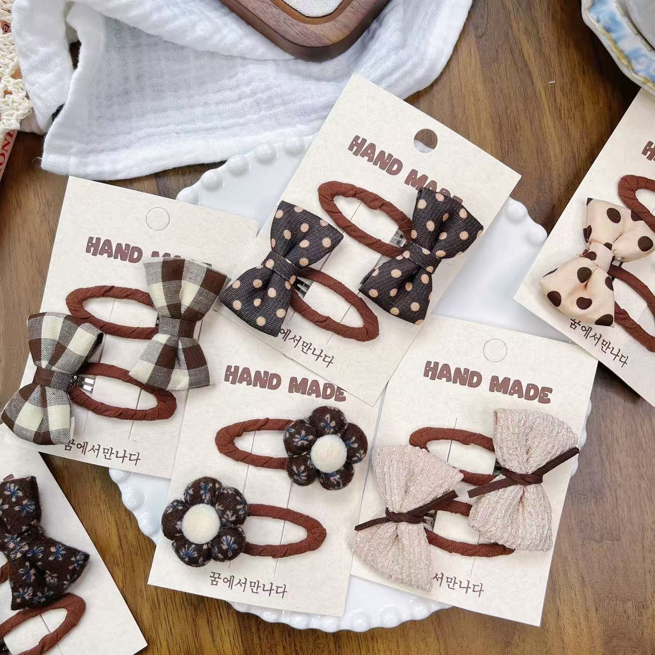 Tejido coreano arco de algodón para niños adornamientos de cabello de color arroz curry anillo de cabello dulce punto de ondulación flor triturada correa de cabello de niñas