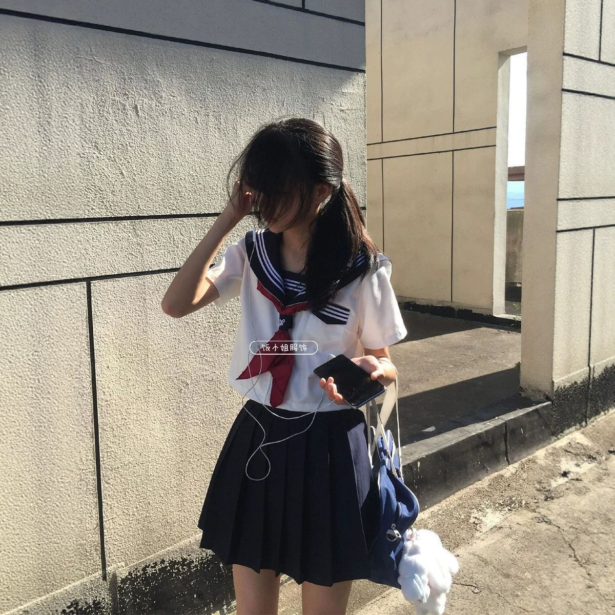 2026 Japanese JK uniform outfit: navy collar white three-piece sailor uniform paired with a matching pleated skirt, a complete soft and cute girl look.