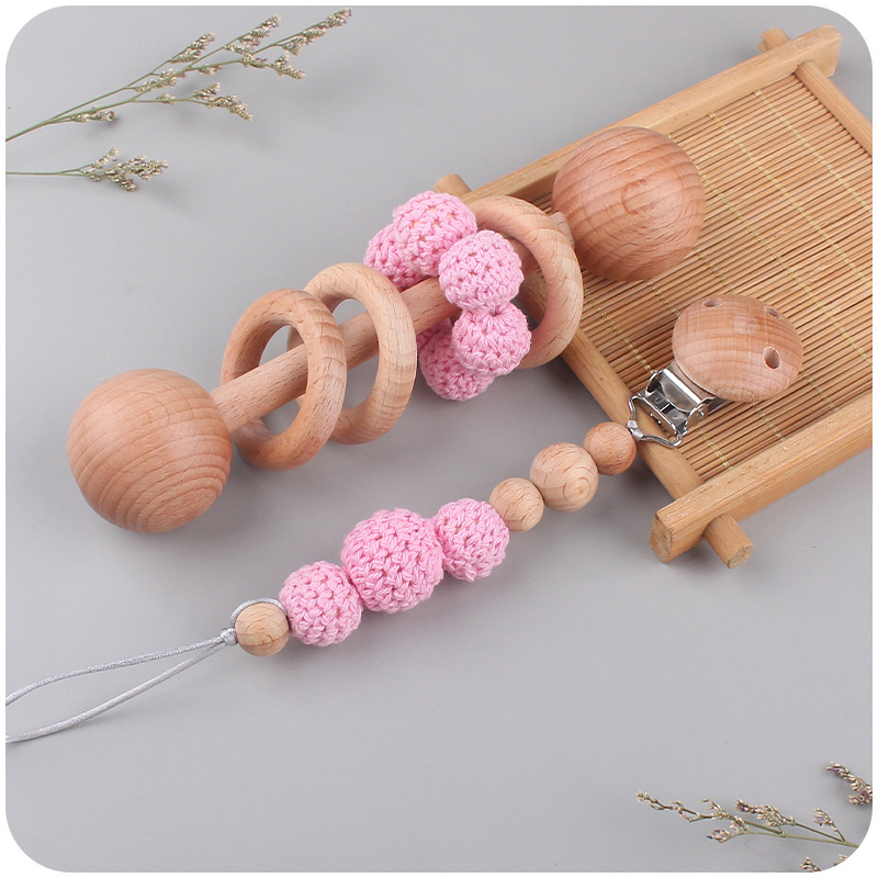 Nuevo bebé suministros Beech Rattle teether juguete calmante bebé bola de lana cuentas de madera pezón cadena traje