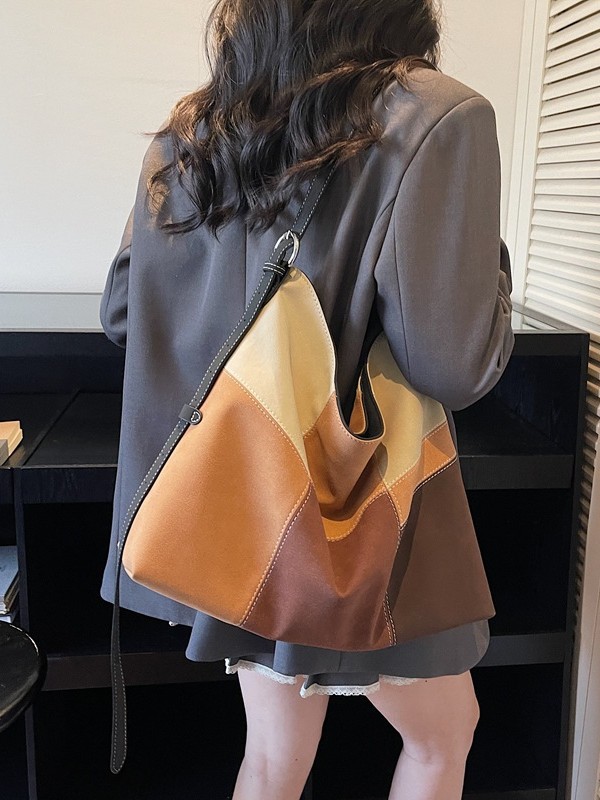 Bolsa de mujer de gran capacidad de hombro bajo la axila venta caliente nueva textura de alta calidad nicho coreano empalme bolso especial