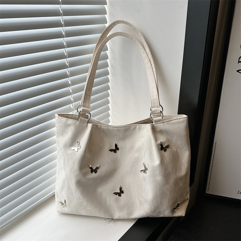 Bolsas de viaje de gran capacidad 2025, nuevas bolsas de mujer casuales, bolsas de arco de hombro para estudiantes universitarios, bolsas de clase.