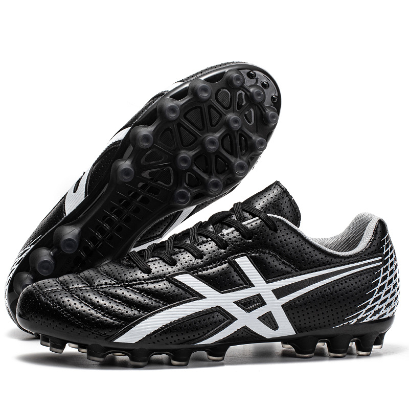 Zapatos de fútbol para hombres y mujeres estudiantes adolescentes AG clavos largos entrenamiento de carreras de clavos al por mayor tecnología ventilada para adolescentes