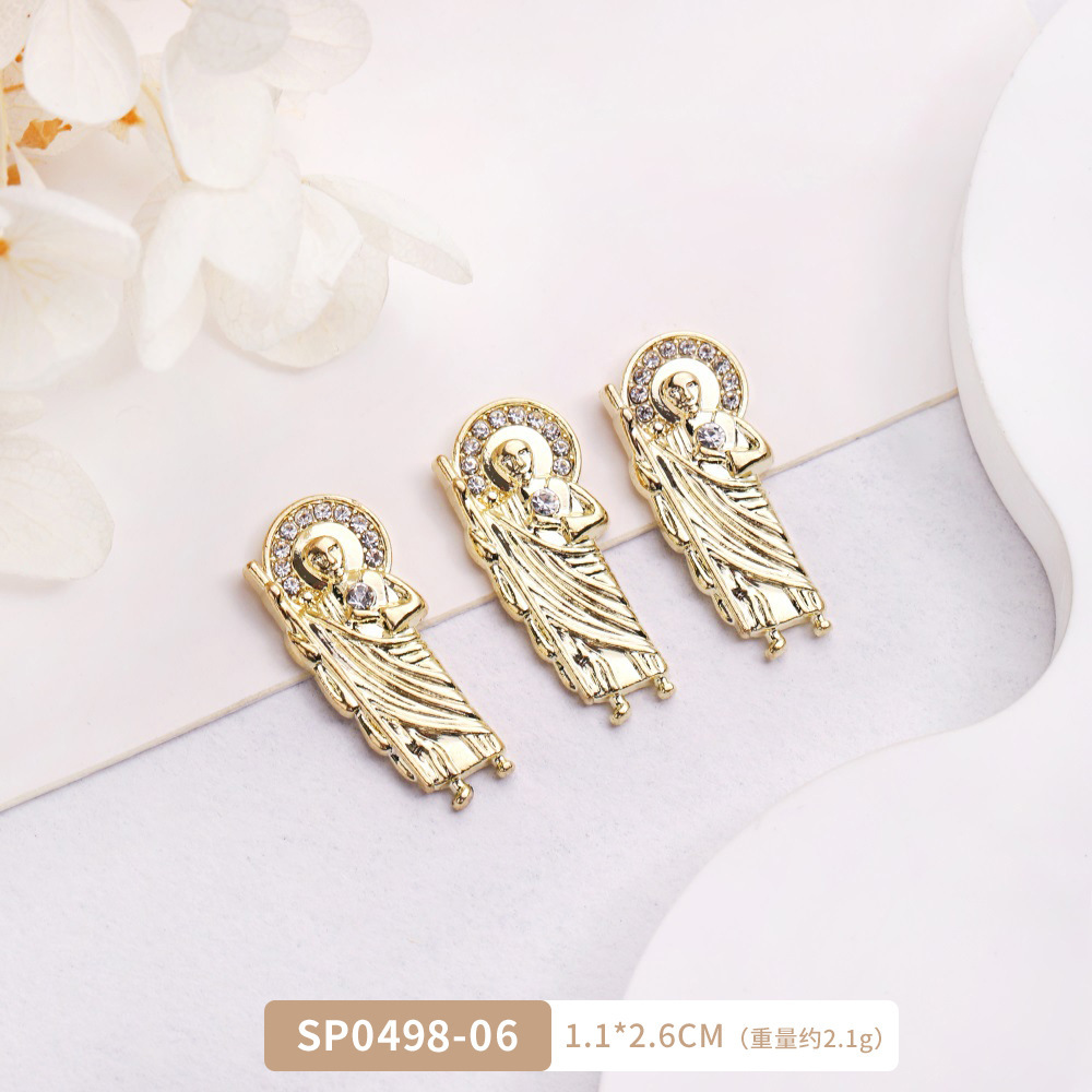 Arte de uñas transfronterizo Jesús accesorios de metal DIY vintage metal aleación uñas arte joyería europea y americana Luz de lujo accesorios con diamante