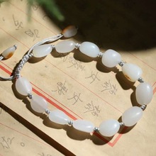 天然新疆和田玉玉器供应链籽料老料白玉俏皮色素面原石手链工艺品