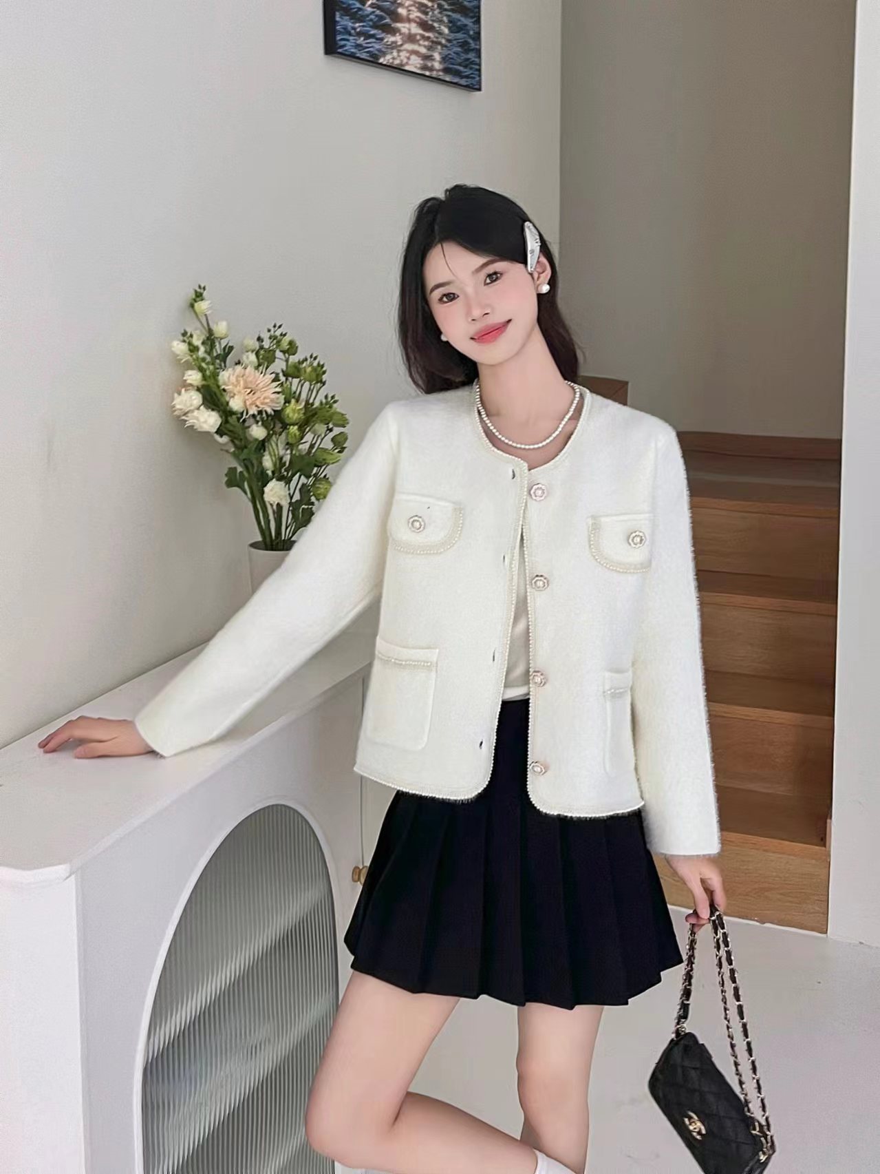 Famous estilo de mujer francesa pequeña fragancia cardigan de punto de mujer otoño y invierno 2024 nuevo cuello redondo manga larga suéter de abrigo