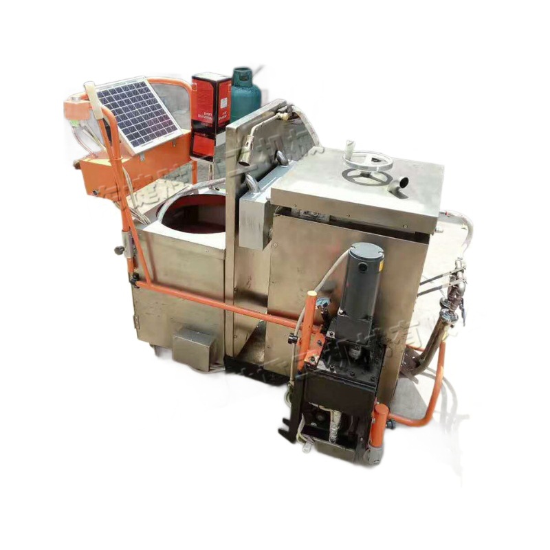 máquina de vertido de asfalto solar máquina de relleno de calentamiento eléctrico de mano máquina de mantenimiento de grietas de pavimento pequeña