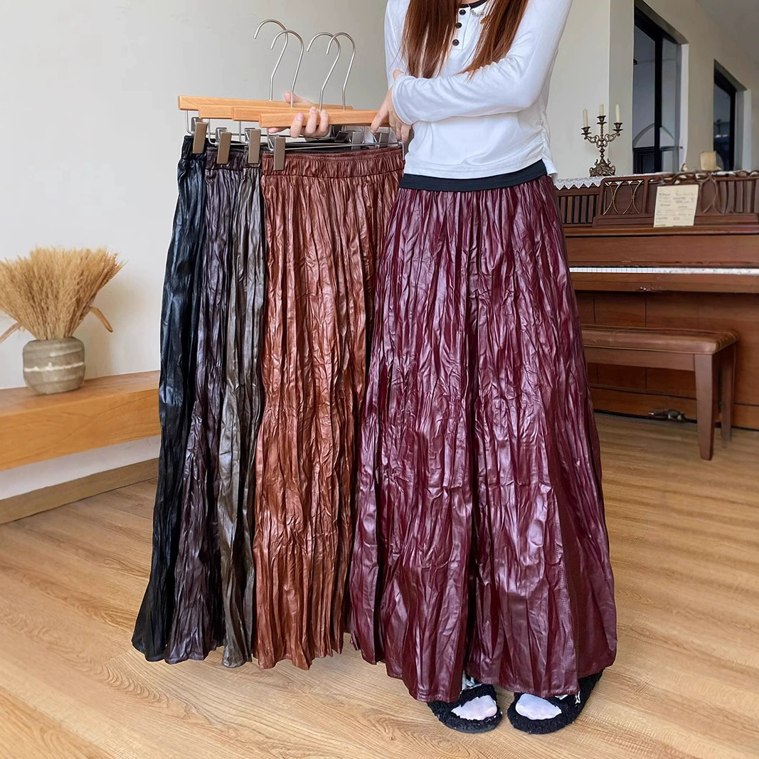 Новая осенняя плиссированная юбка 2025 года с завышенной талией, женская кожаная юбка, фактурная нишевая плиссированная юбка А-силуэта «парасолька»