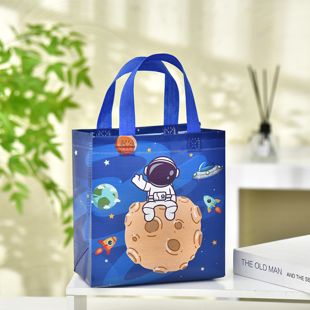 Bolso no tejido de astronauta de dibujos animados transfronterizo bolso de regalo de astronauta portátil bolso de regalo de niños lindos al por mayor