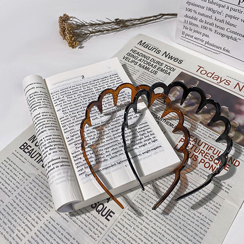 Simple acabado de cabello roto artefacto de gran onda 2024 nuevo tipo con dientes antideslizante temperamento de alto cráneo fijación de cabeza