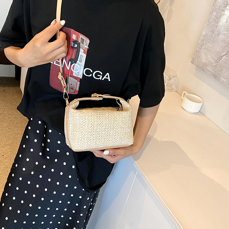 Bolsa de vacaciones de paja de estilo de verano para mujeres, nuevo nicho de diseño de hombro, bolso de mano, bolso de vacaciones de playa