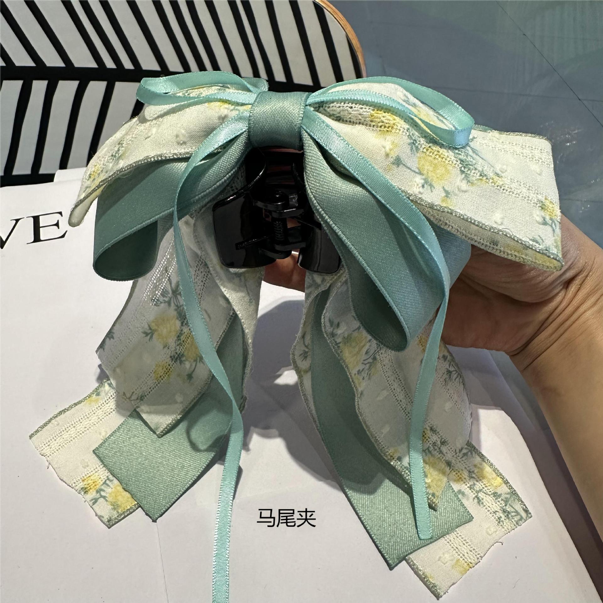 網紗甜美滿天星蝴蝶結飄帶抓夾高級感低馬尾髮夾後腦勺盤發頭飾品