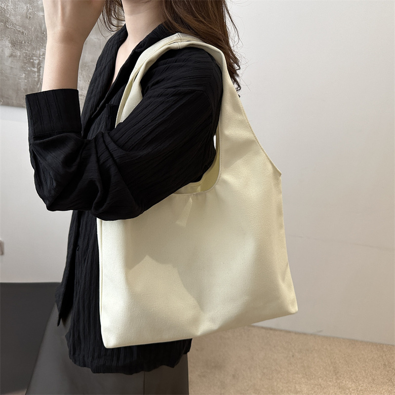 . Moda simple de gran capacidad de verano de color sólido nuevo estilo coreano de moda ocio de viaje bolso de hombro bolso de mujer