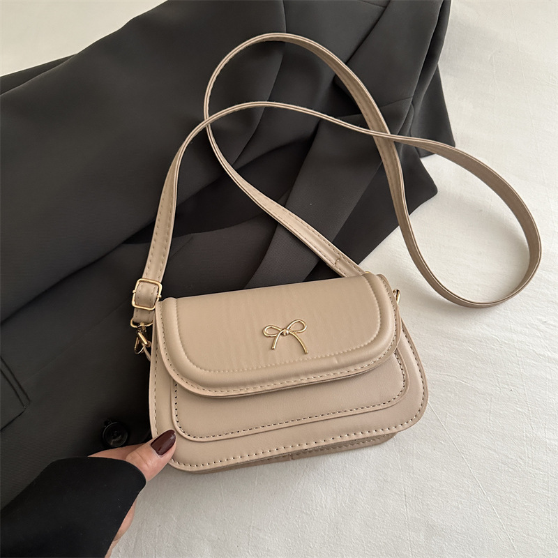 Bolso de lazo coreano para mujer 2025 primavera y verano nuevo bolso de silla simple de moda bolso de mensajero de hombro literario de moda