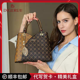 小容量女包2024新款潮流时尚印花单肩斜挎包百搭水桶包质感手提包