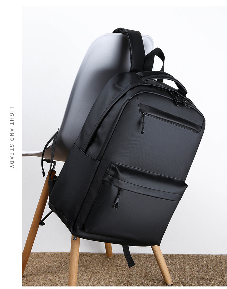 Cross-border wholesale of new large-capacity school bags for junior and senior high school students, foreign trade backpacks, men's Korean version simple commuting computer bags undefined