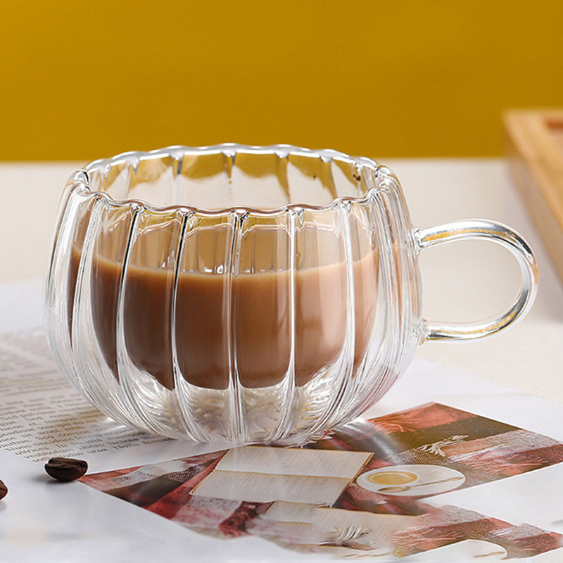 Taza de vidrio de alta borosilicona transparente con mango creativo de alta temperatura resistente a la taza de café