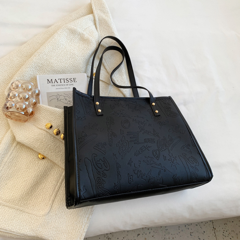 Bolso de mujer 2024 primavera nuevo nicho lienzo de cuatro hojas de gran capacidad bolso de hombro simple bolso de todo tipo