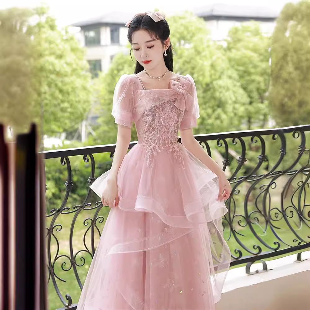 Vestido de noche rosa para mujer, nuevo modelo 2026, estilo de lujo ligero, nicho de alta gama, sofisticado, para ceremonia de mayor edad, presentación, examen de arte escénico