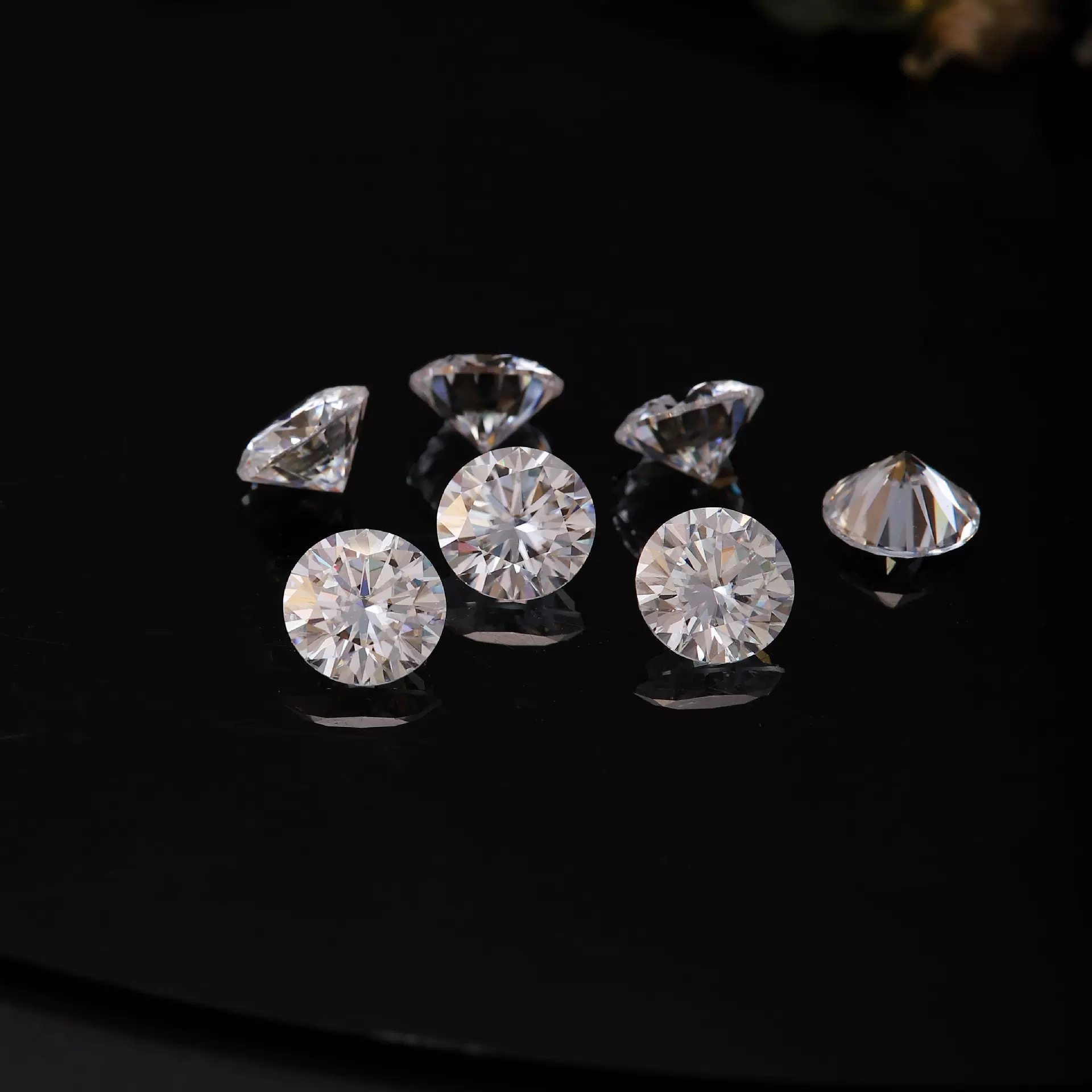 梧州永佳宝石圆形莫桑石批发裸石D色八星八箭钟表镶嵌穿甲戴配石